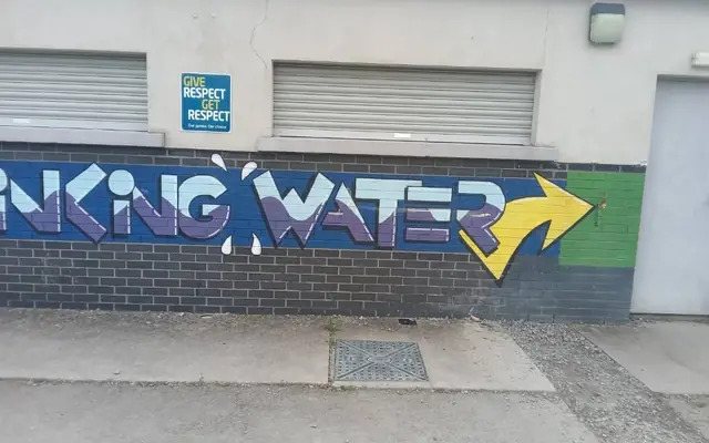The drinking water mural on the clubhouse